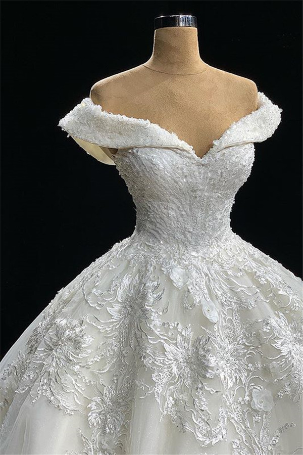 Modest Off-Shoulder White A-Line Wedding Dress with Tulle Ruffles and Appliques